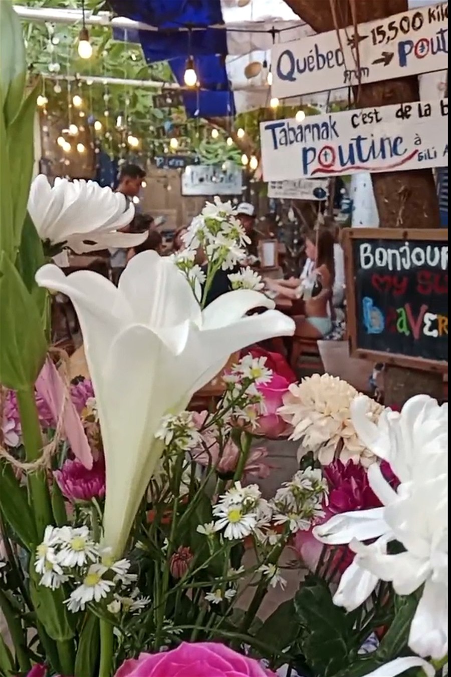Garden flowers with Poutine Gili Air tables in the background